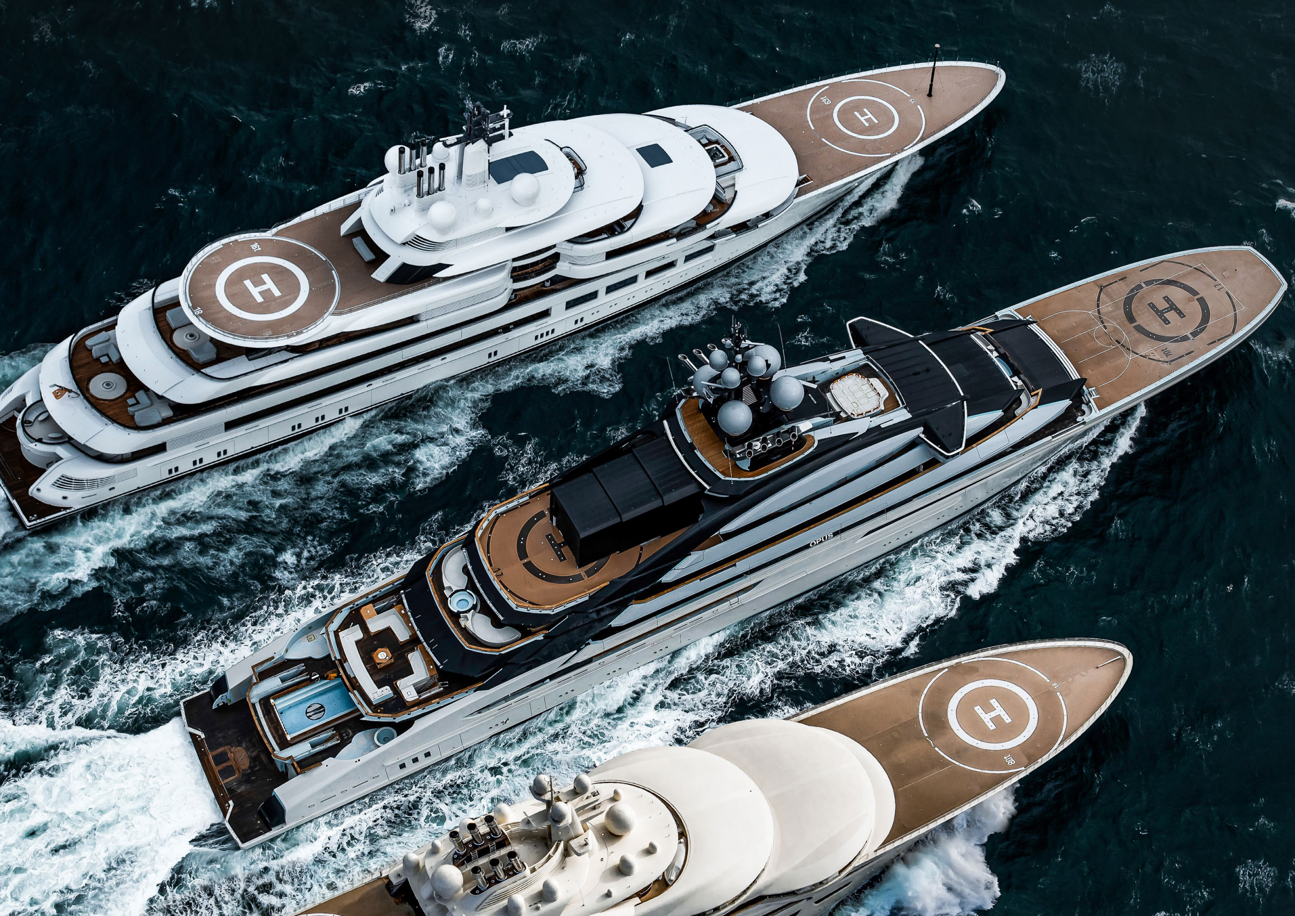 Superyachts moored side by side, seen from above